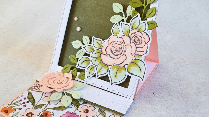 Floral Charm Arched Easel Handmade card with an arched front that stands up when caught against a stopper that goes across the bottom. The supplies are from Floral Charm Suite by Stampin' Up! The colours are soft pinks and greens with white.
