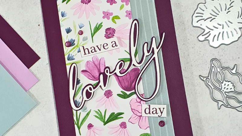 Handmade card in dark purple with floral paper and have a lovely day on the front. Inside is a double gate fold with the same floral paper from Stampin' Up!