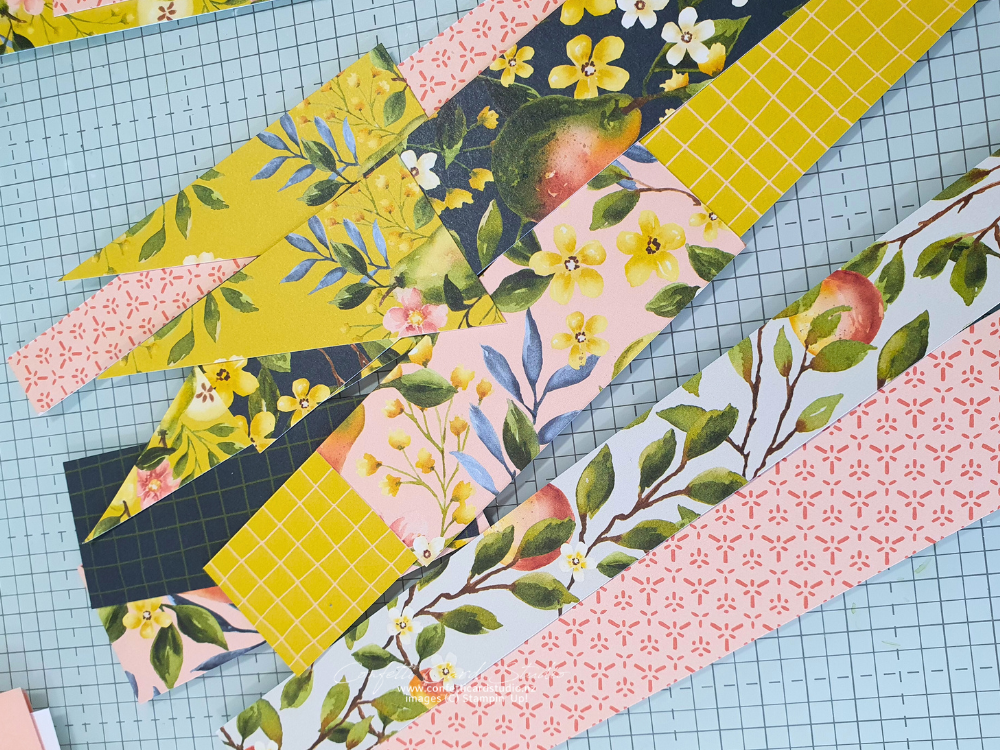 Scraps of Painterly Pear Designer Series Paper (DSP) wready to be trimmed