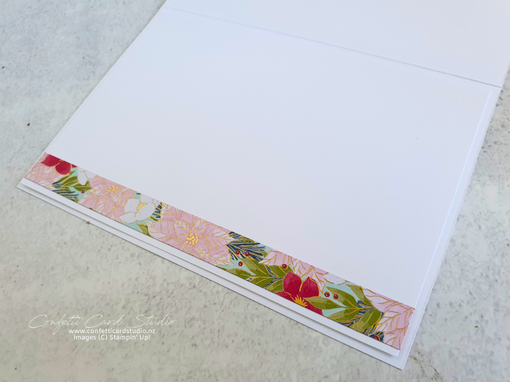 Inside of the handmade card with a strip of coordinating DSP