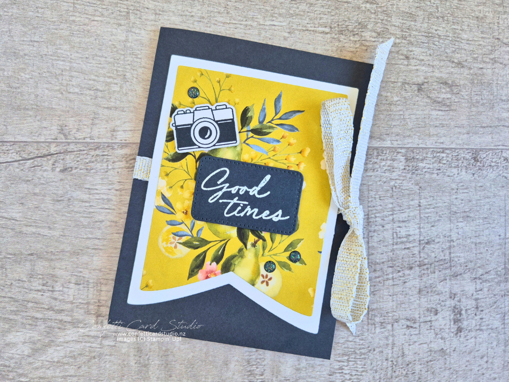 Flip flap album for travel memories made with Painterly Pears designer series paper, Secret Sea cardstock, and photo themed embellishments.