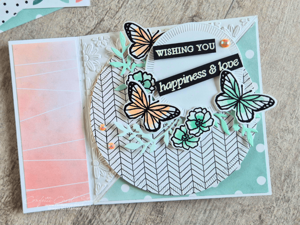 Stampin' Up! Beautiful Ordinary Life twisted easel card displayed open. Decorated with watercoloured butterflies and flowers.