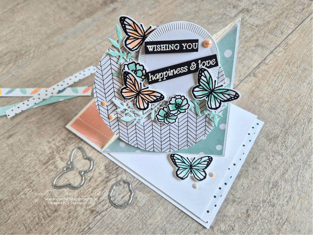 Stampin' Up! Beautiful Ordinary Life twisted easel card displayed open. Decorated with watercoloured butterflies and flowers.