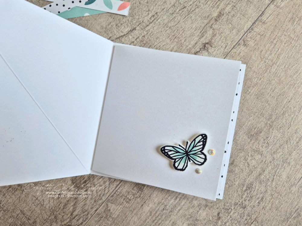 Inner section showing the butterfly stopper to hold the easel card open for display.