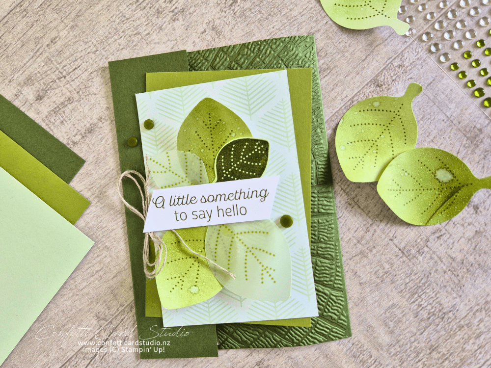 Green handmade greeting card featuring layered punched leaves created from blending brush custom cardstock, Designer Series Paper and textured cardstock