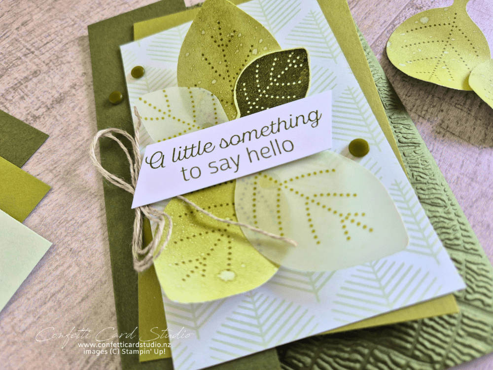 Green handmade greeting card featuring layered punched leaves created from blending brush custom cardstock, Designer Series Paper and textured cardstock Close Up of leaves