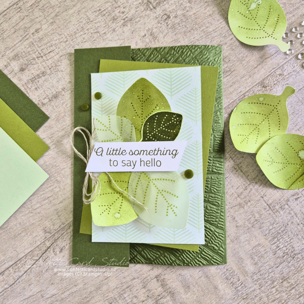 Green handmade greeting card featuring layered punched leaves created from blending brush custom cardstock, Designer Series Paper and textured cardstock